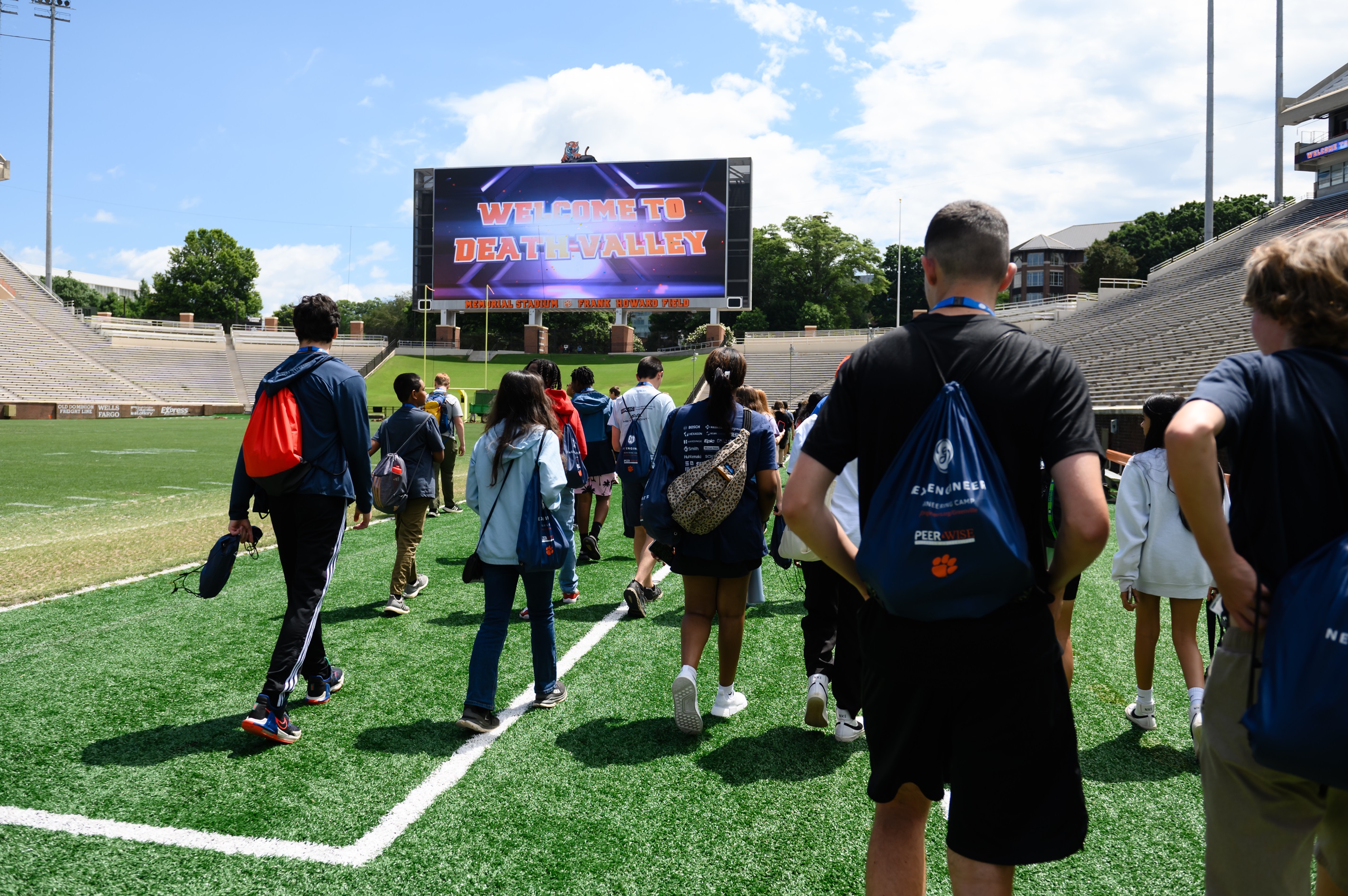 Students tour football stadium